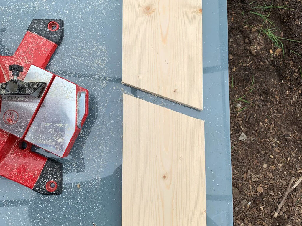 Piece of wood getting cut in half.