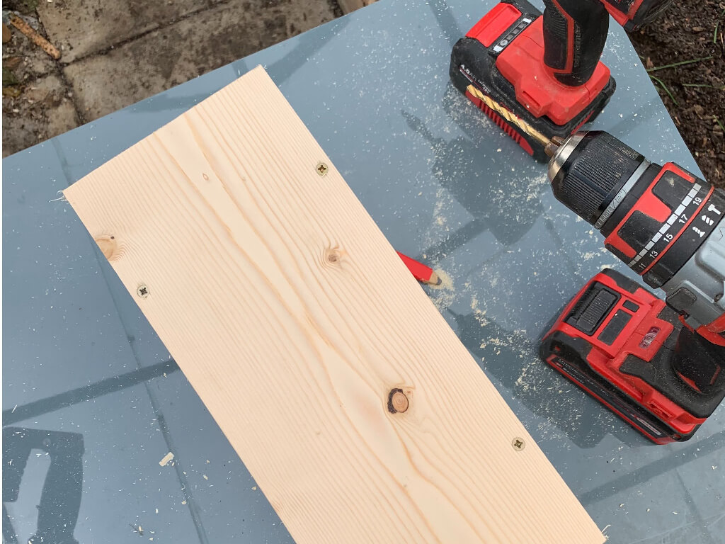 A piece of wood and Einhell products.